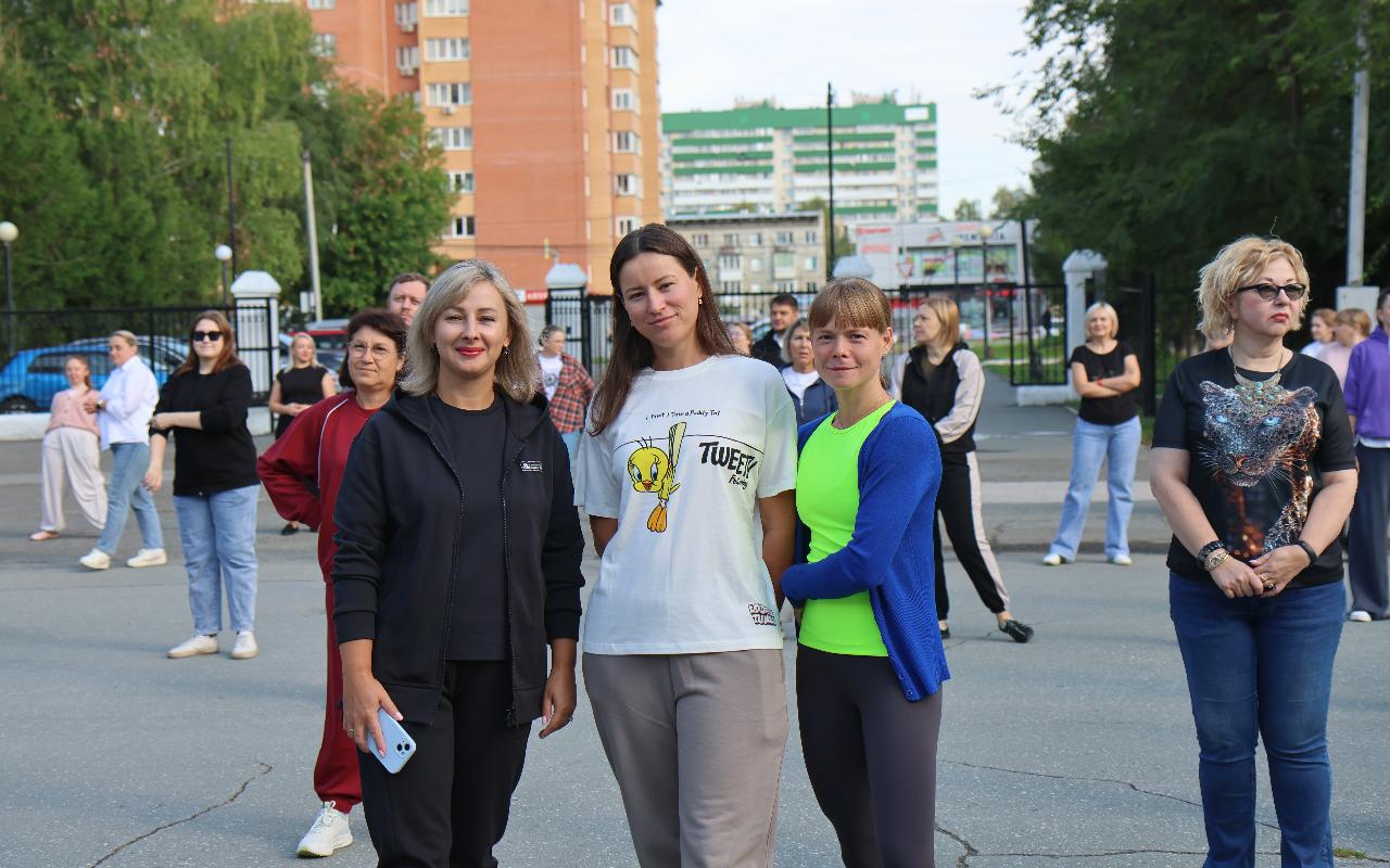 ФОТО к новости: Заряд бодрости и настроения: титулованные спортсмены провели зарядку для коллектива НГПУ 